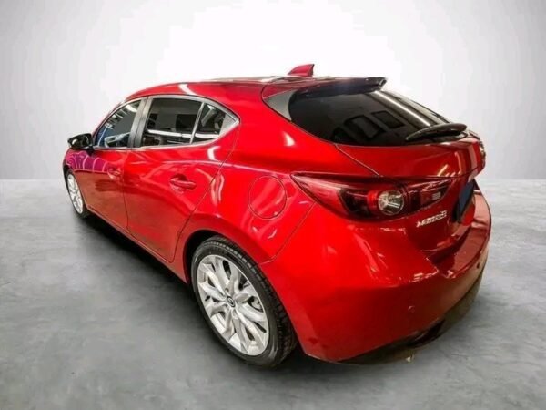 1000020557.jpg Mazda 3