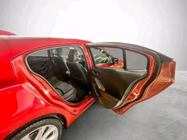 1000020562.jpg Mazda 3