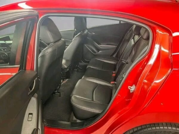 1000020570.jpg Mazda 3